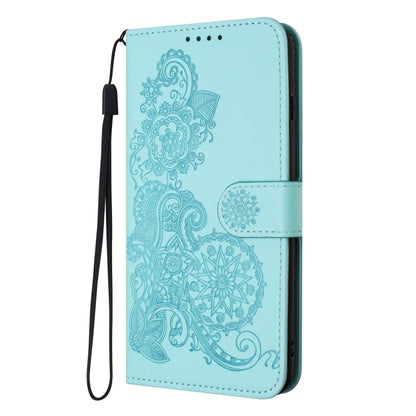 For Xiaomi Redmi Note 13 Pro 4G Datura Flower Embossed Flip Leather Phone Case(Light blue) - Note 13 Pro Cases by buy2fix | Online Shopping UK | buy2fix